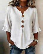 Sofía | Blusa lisa de algodón y lino con botones de madera y volantes
