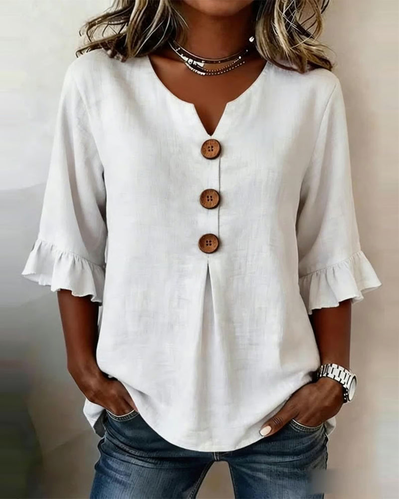 Sofía | Blusa lisa de algodón y lino con botones de madera y volantes