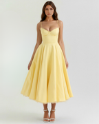 Selene | Vestido midi amarillo mantequilla con capas de tul y bolsillos secretos