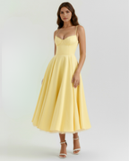 Selene | Vestido midi amarillo mantequilla con capas de tul y bolsillos secretos