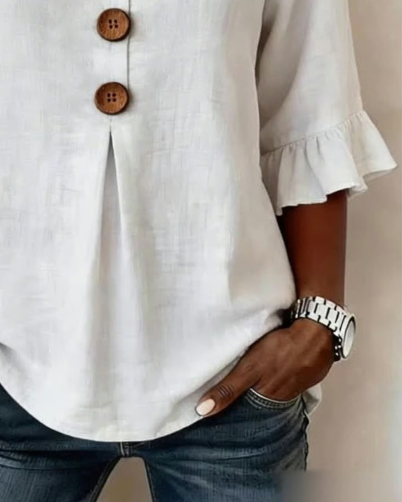 Sofía | Blusa lisa de algodón y lino con botones de madera y volantes