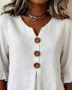 Sofía | Blusa lisa de algodón y lino con botones de madera y volantes