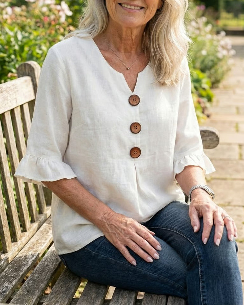 Sofía | Blusa lisa de algodón y lino con botones de madera y volantes