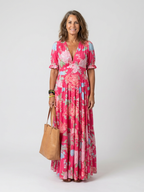 Claudia™ | Vestido midi floral sin mangas con escote en V
