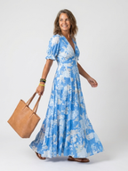 Claudia™ | Vestido midi floral sin mangas con escote en V