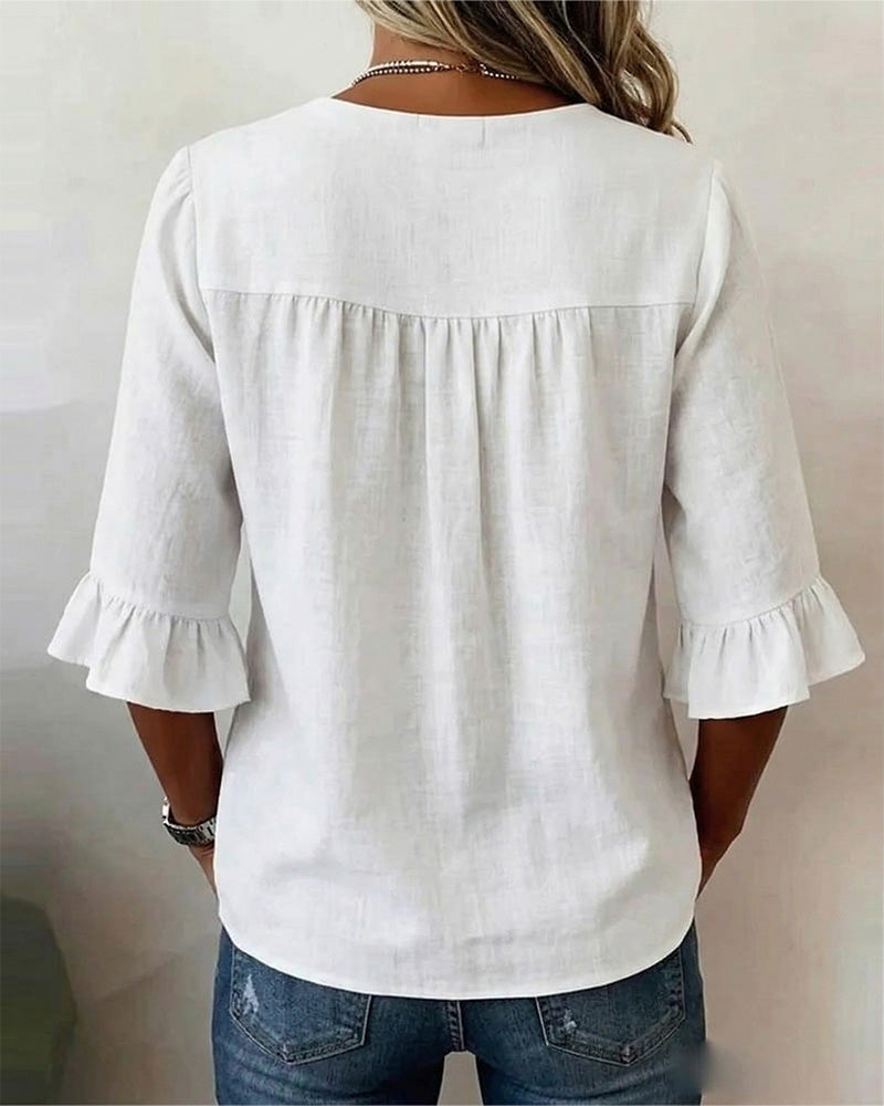 Sofía | Blusa lisa de algodón y lino con botones de madera y volantes