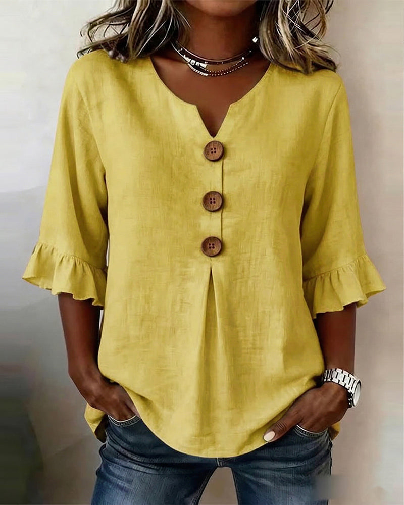 Sofía | Blusa lisa de algodón y lino con botones de madera y volantes