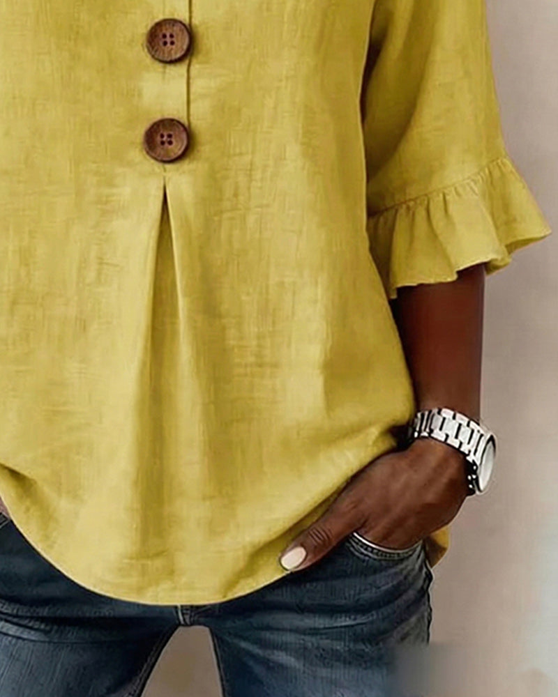 Sofía | Blusa lisa de algodón y lino con botones de madera y volantes